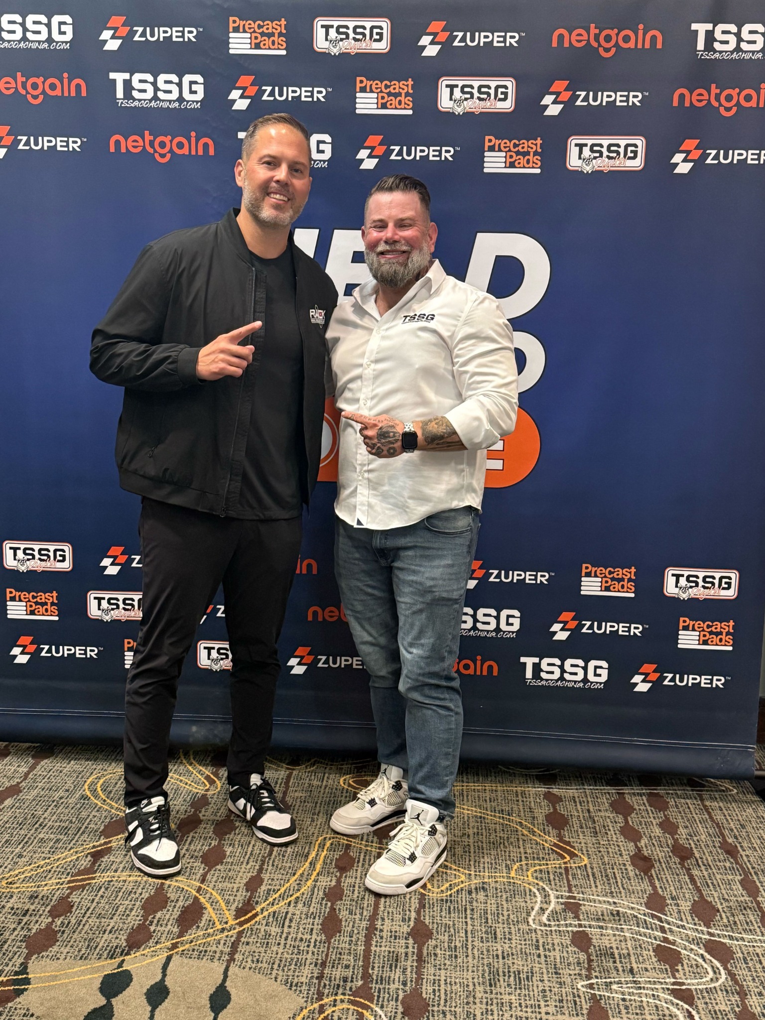 Chris Stilwell with a generator industry leader at a TSSG event